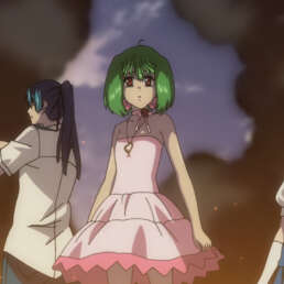 Ranka flanked by Alto and Sheryl with smoke and fire rising around them